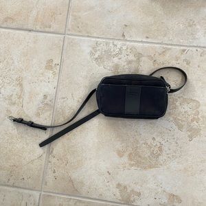 Black coach belt bag in very good condition. Barley used!